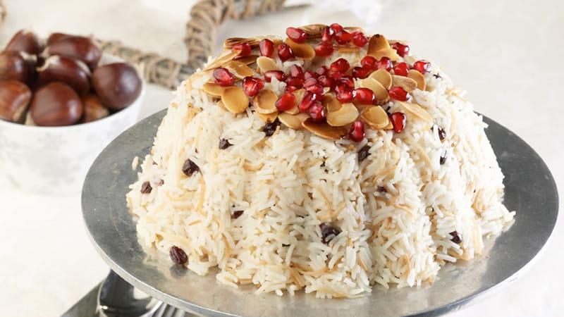 recipe image Ριζότο με καβουρδισμένο φιδέ, ξηρούς καρπούς και ρόδι